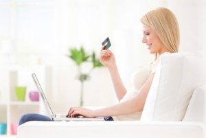 woman-shopping-online-living-room-horiz